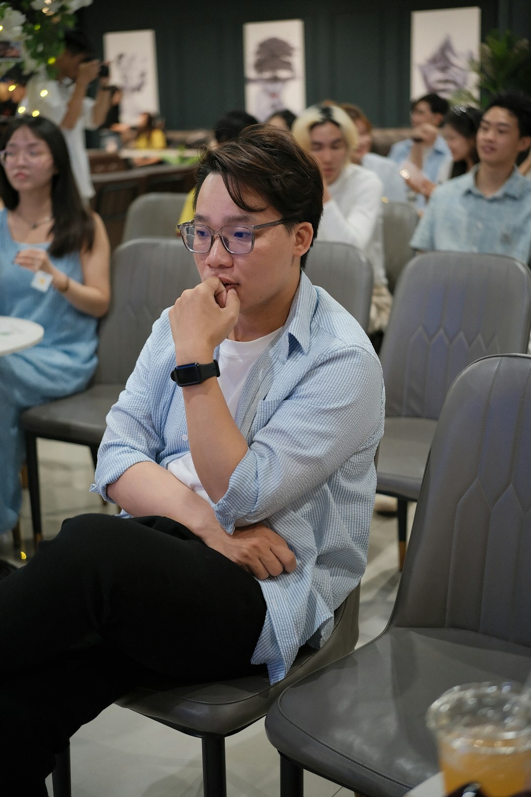 Moderator leading a focus group discussion with participants