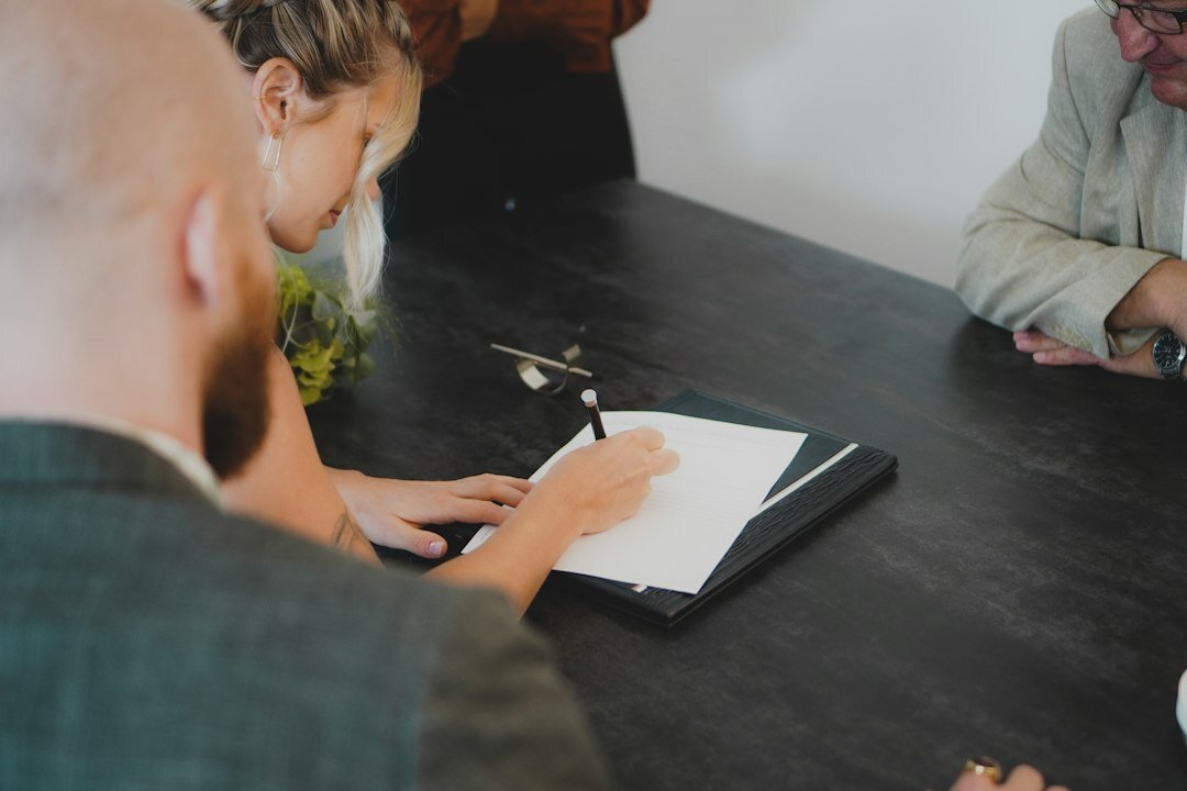 people filling out survey forms